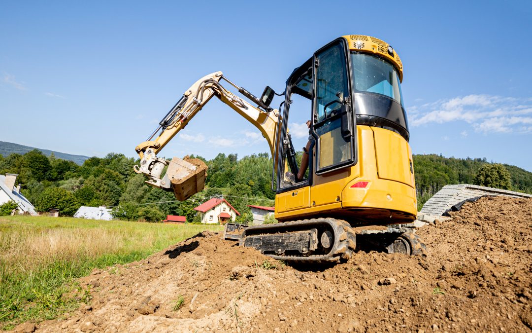 Mini excavator digging